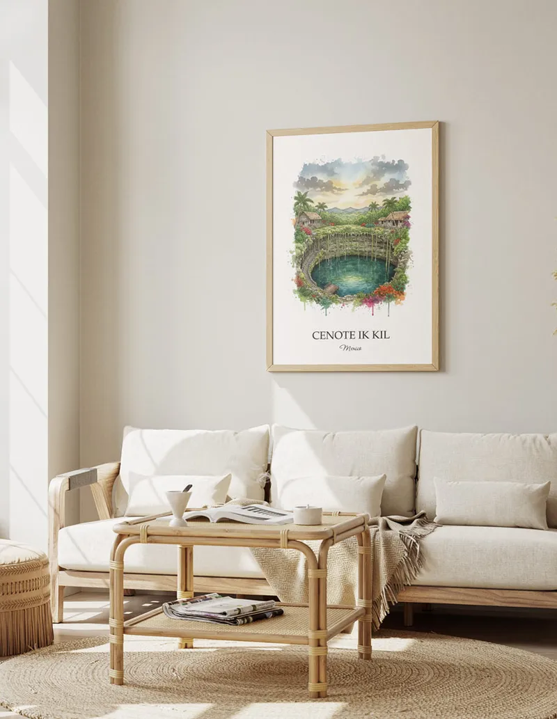 Cozy, well-lit workspace with a minimalist poster of Cenote Ik Kil, Mexico in a light frame sitting on the desk.