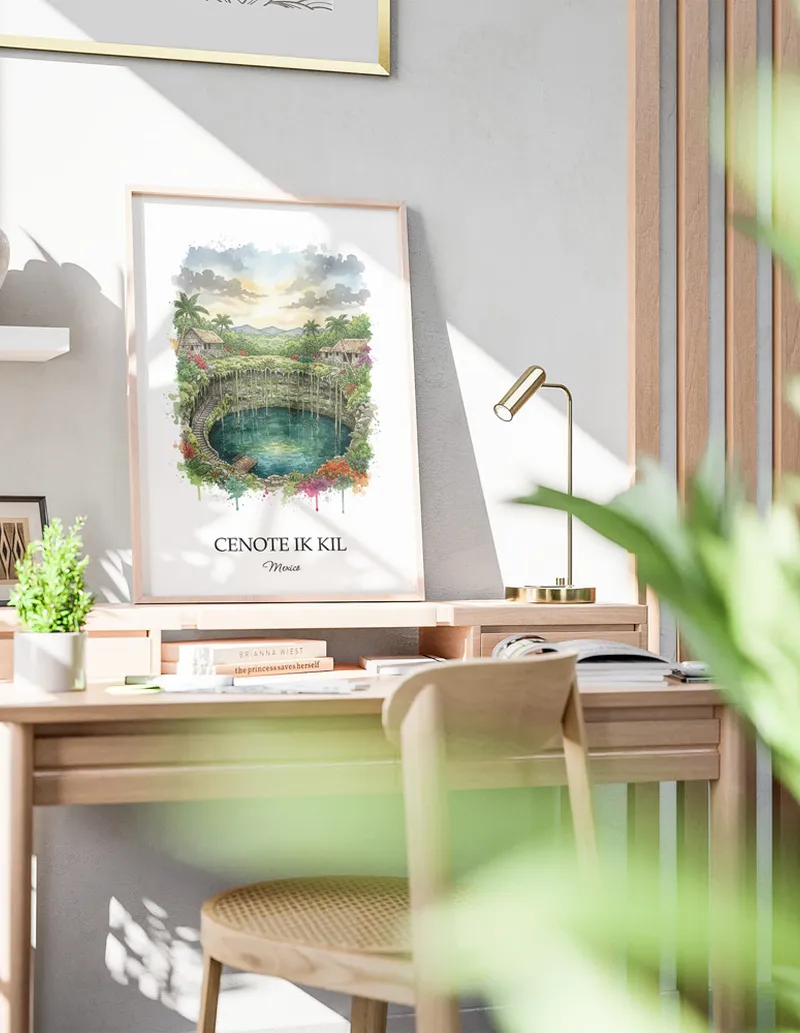 Framed wall art featuring Cenote Ik Kil in Mexico in a light wood frame leaning on the floor.