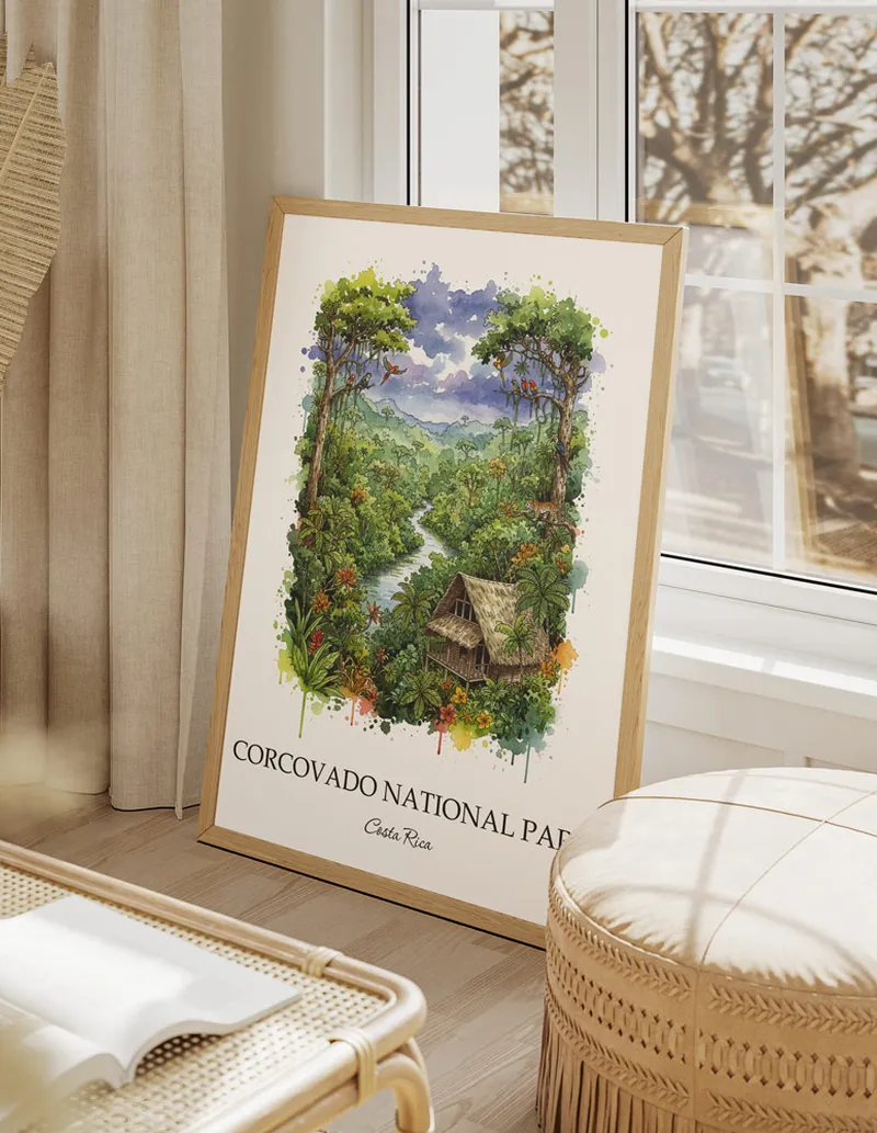 A gorgeous boho-inspired living space with a framed vintage travel poster of Corcovado National Park in Costa Rica on display.