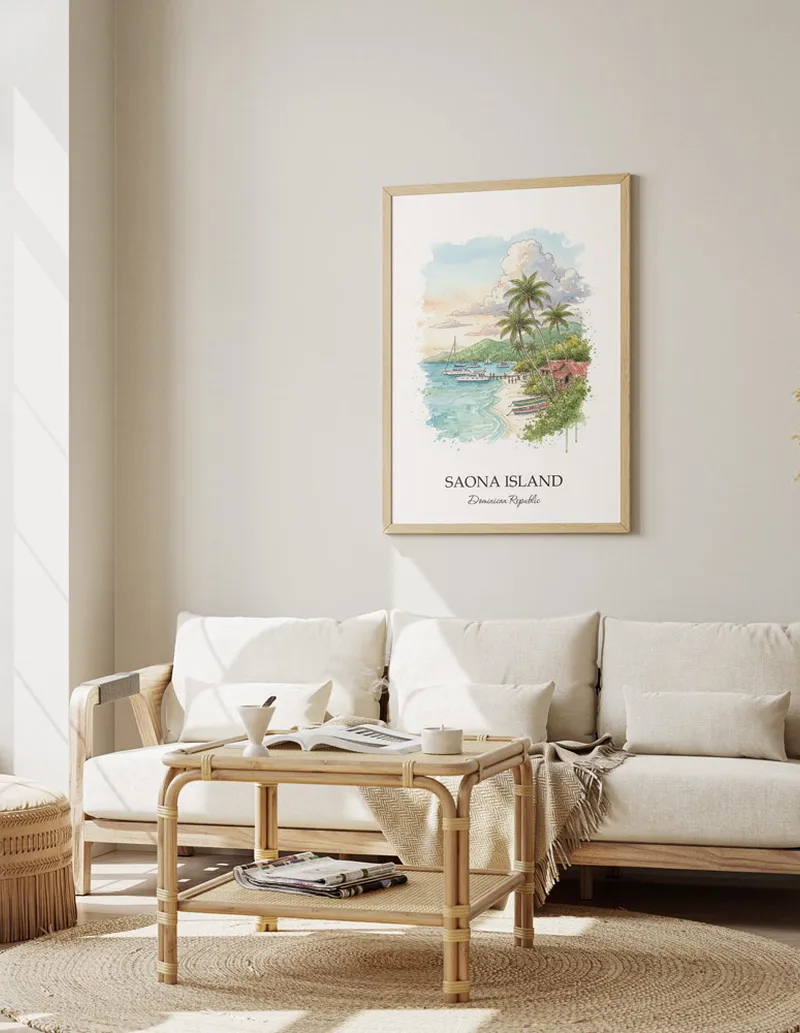 Cozy, well-lit workspace with a minimalist poster of Saona Island, Dominican Republic in a light frame sitting on the desk.