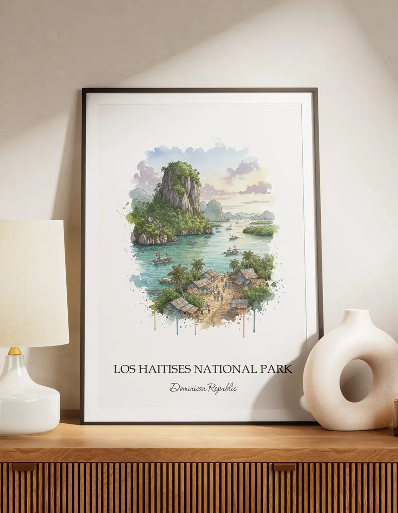 Vintage travel poster of Los Haitises National Park, Dominican Republic in a light frame displayed above a sofa in a bright boho interior.
