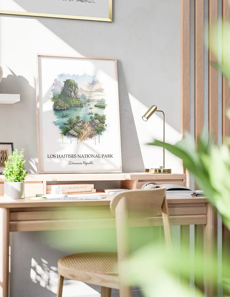 Framed wall art featuring Los Haitises National Park in Dominican Republic in a light wood frame leaning on the floor.