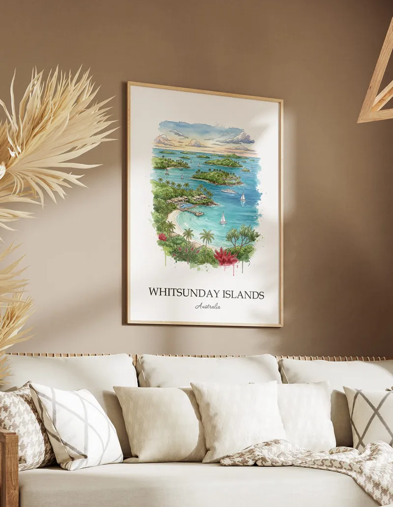 A clean and modern mockup showing a framed Whitsunday Islands, Australia print on a minimalist background.