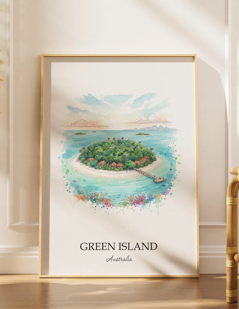 Minimalist poster of Green Island in Australia in a light frame standing by a window in a boho style room.
