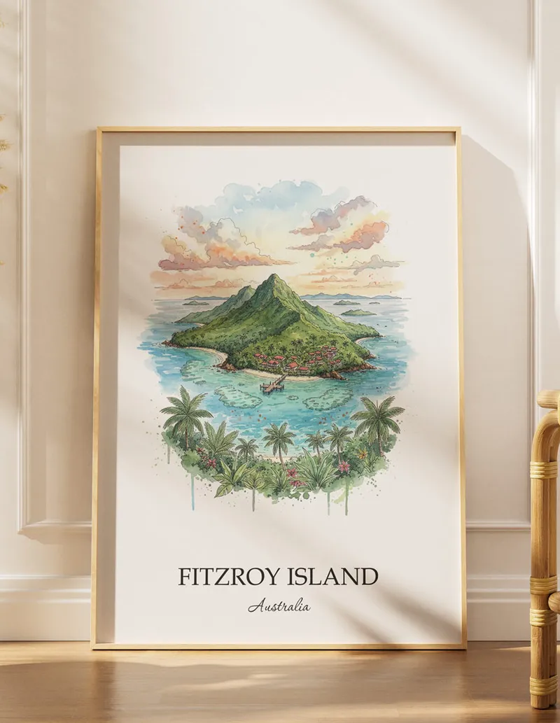 Minimalist poster of Fitzroy Island in Australia in a light frame standing by a window in a boho style room.