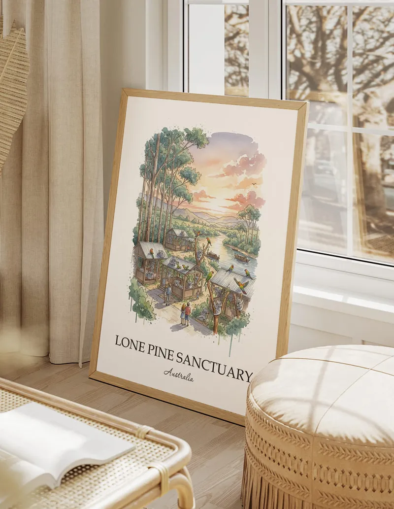 Cozy, well-lit workspace with a minimalist poster of Lone Pine Sanctuary, Australia in a light frame sitting on the desk.