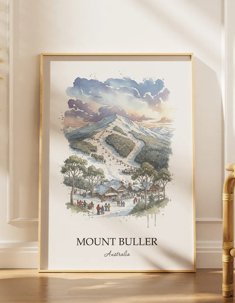 Framed wall art featuring Mount Buller, Australia in a light wood frame hanging above a sofa in a modern living room.