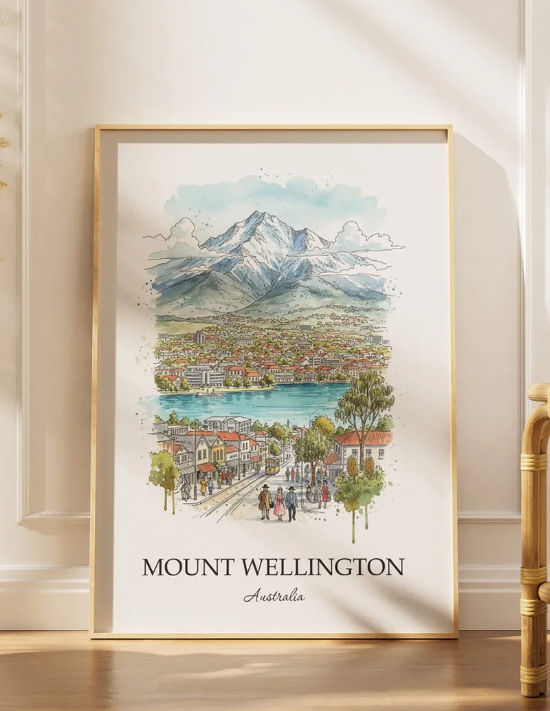 Framed wall art featuring Mount Wellington, Australia in a light wood frame hanging above a sofa in a modern living room.