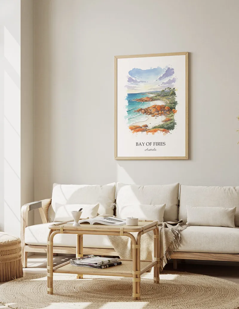 A clean and modern mockup showing a framed Bay of Fires, Australia print on a minimalist background.