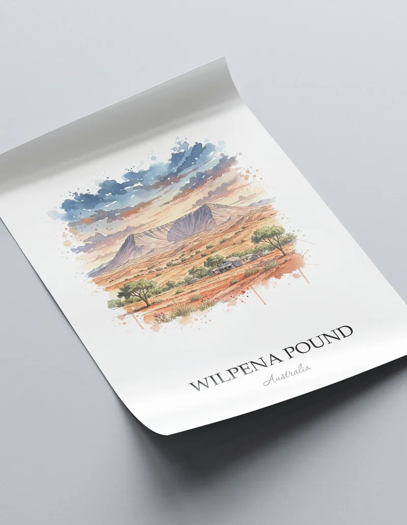 Minimalist poster of Wilpena Pound in Australia in a light frame standing by a window in a boho style room.