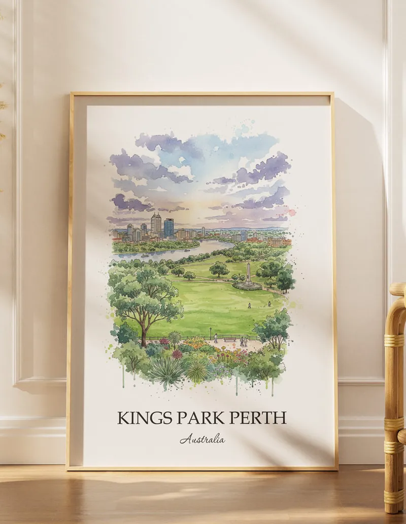 Framed wall art featuring Kings Park Perth, Australia in a light wood frame hanging above a sofa in a modern living room.