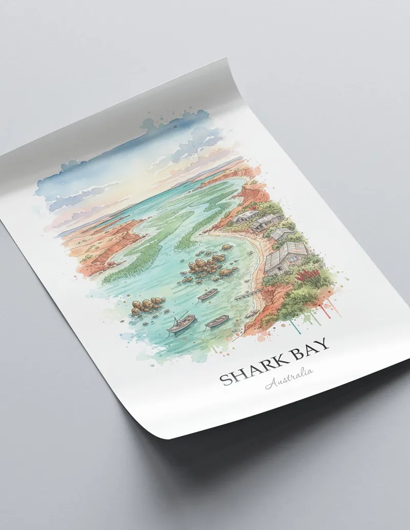 Framed wall art featuring Shark Bay, Australia in a light wood frame hanging above a sofa in a modern living room.