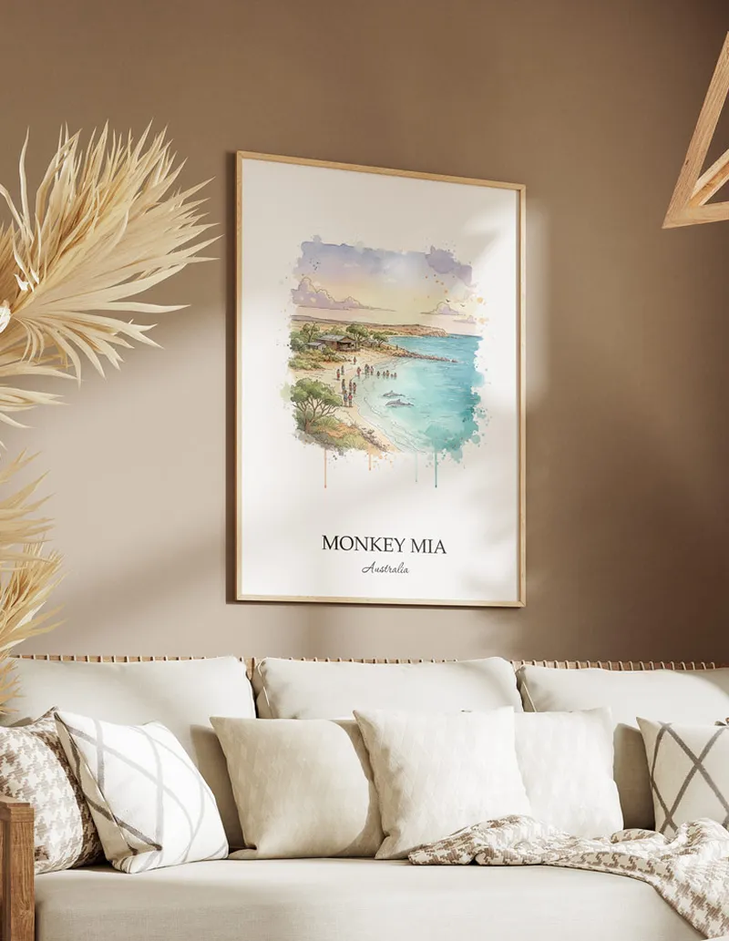 Framed wall art featuring Monkey Mia in Australia in a light wood frame leaning on the floor.