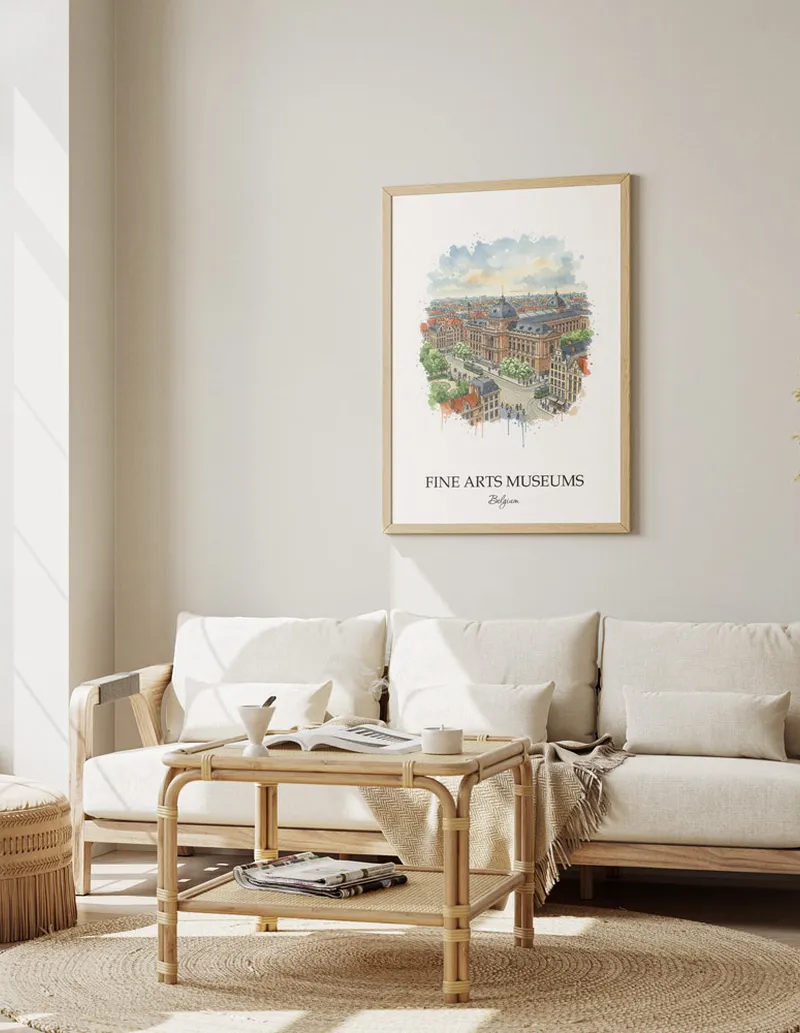 Framed wall art featuring Fine Arts Museums, Belgium in a light wood frame hanging above a sofa in a modern living room.