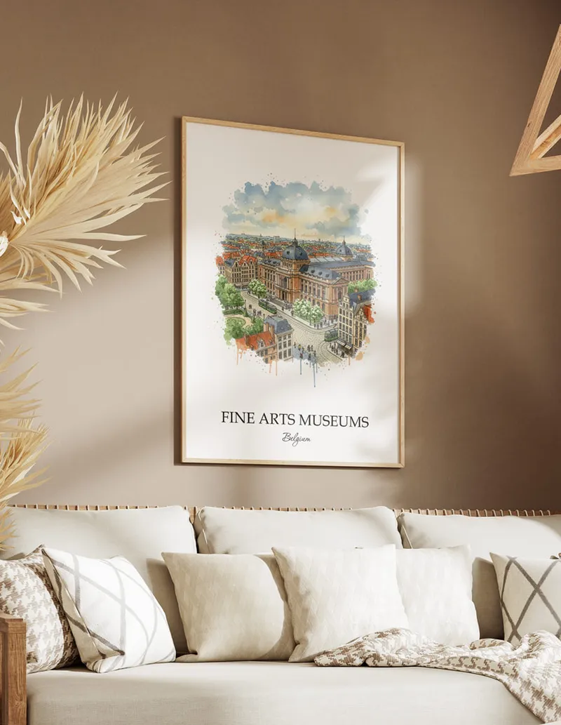 Vintage travel poster of Fine Arts Museums, Belgium in a light frame displayed above a sofa in a bright boho interior.