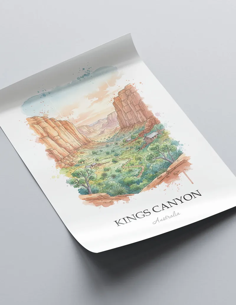 Framed wall art featuring Kings Canyon, Australia in a light wood frame hanging above a sofa in a modern living room.