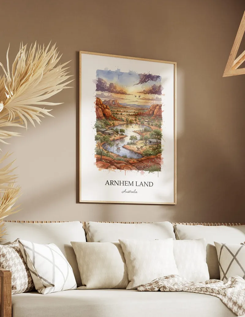 Framed wall art featuring Arnhem Land in Australia in a light wood frame leaning on the floor.
