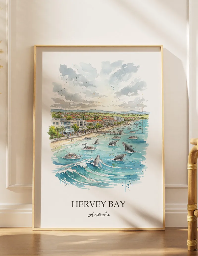 A gorgeous boho-inspired living space with a framed vintage travel poster of Hervey Bay in Australia on display.