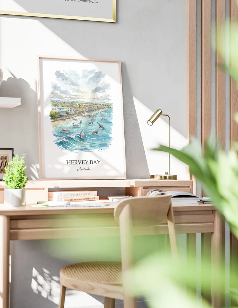 Minimalist poster of Hervey Bay in Australia in a light frame standing by a window in a boho style room.