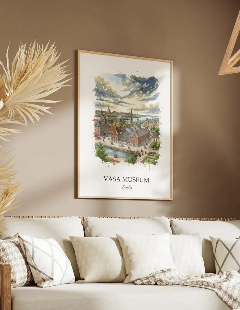 Vintage travel poster of Vasa Museum, Sweden in a light frame displayed above a sofa in a bright boho interior.