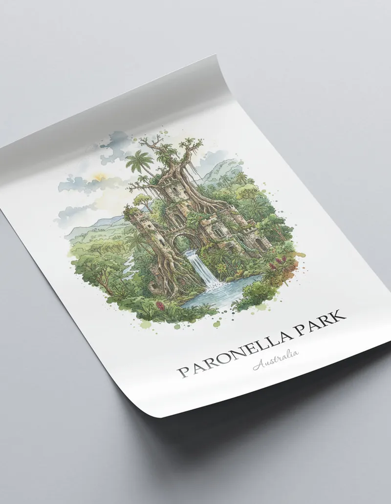 Vintage travel poster of Paronella Park, Australia in a light frame displayed above a sofa in a bright boho interior.