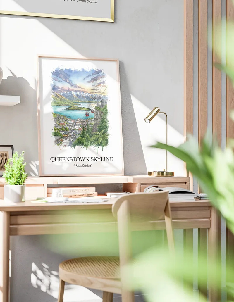 Minimalist poster of Queenstown Skyline in New Zealand in a light frame standing by a window in a boho style room.