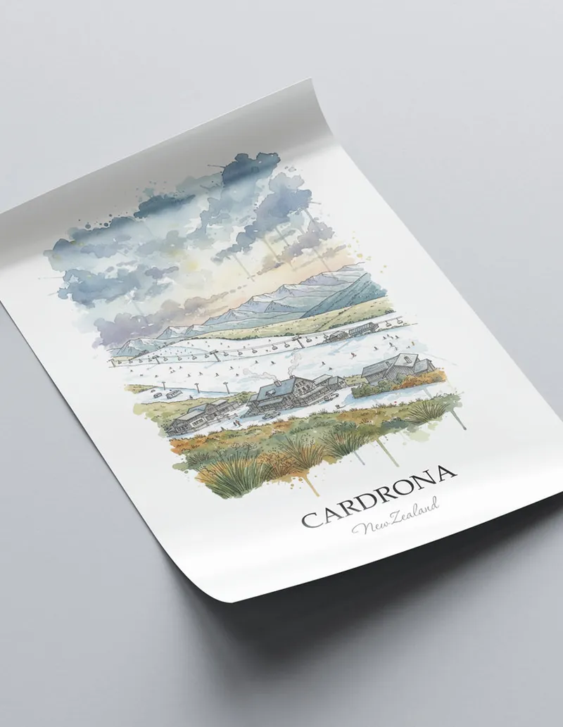 Vintage travel poster of Cardrona, New Zealand in a light frame displayed above a sofa in a bright boho interior.