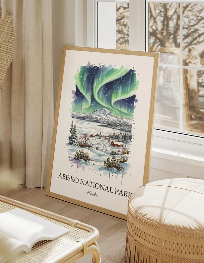 Minimalist poster of Abisko National Park in Sweden in a light frame standing by a window in a boho style room.