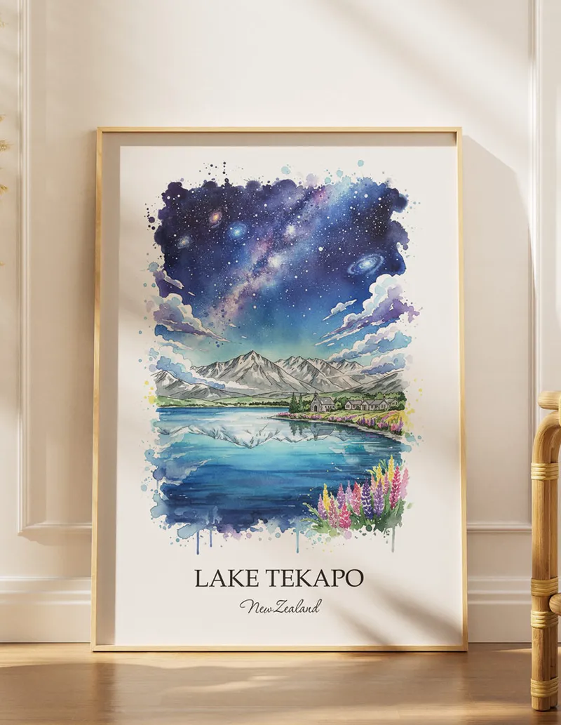 A gorgeous boho-inspired living space with a framed vintage travel poster of Lake Tekapo in New Zealand on display.