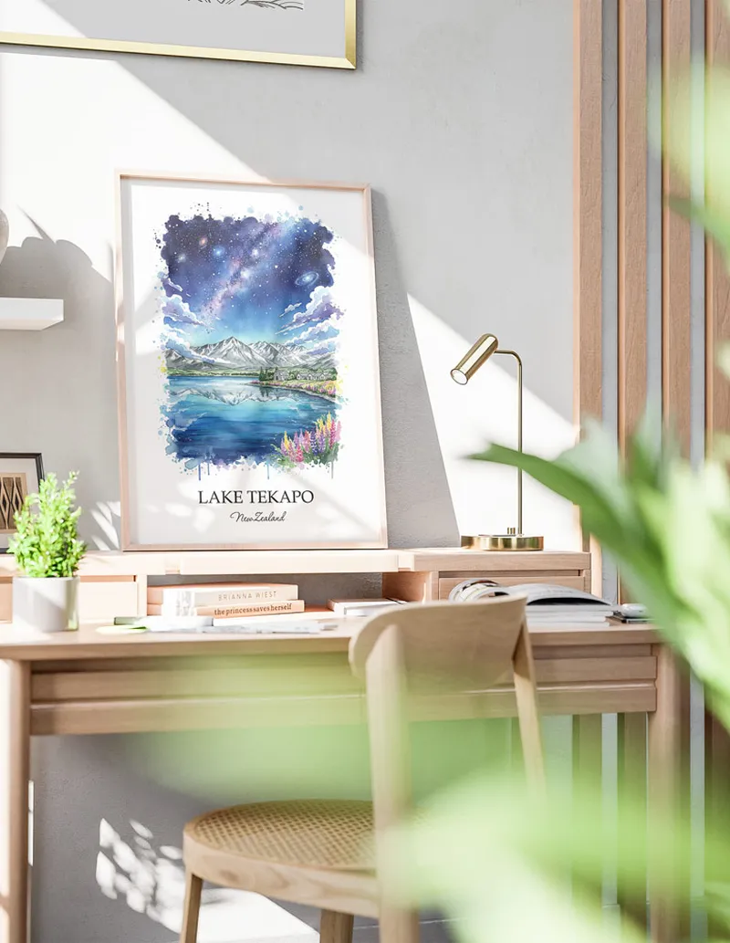 Minimalist poster of Lake Tekapo in New Zealand in a light frame standing by a window in a boho style room.