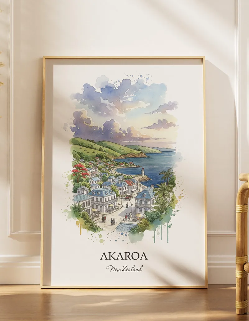 A gorgeous boho-inspired living space with a framed vintage travel poster of Akaroa in New Zealand on display.