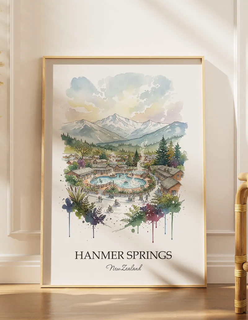 A gorgeous boho-inspired living space with a framed vintage travel poster of Hanmer Springs in New Zealand on display.