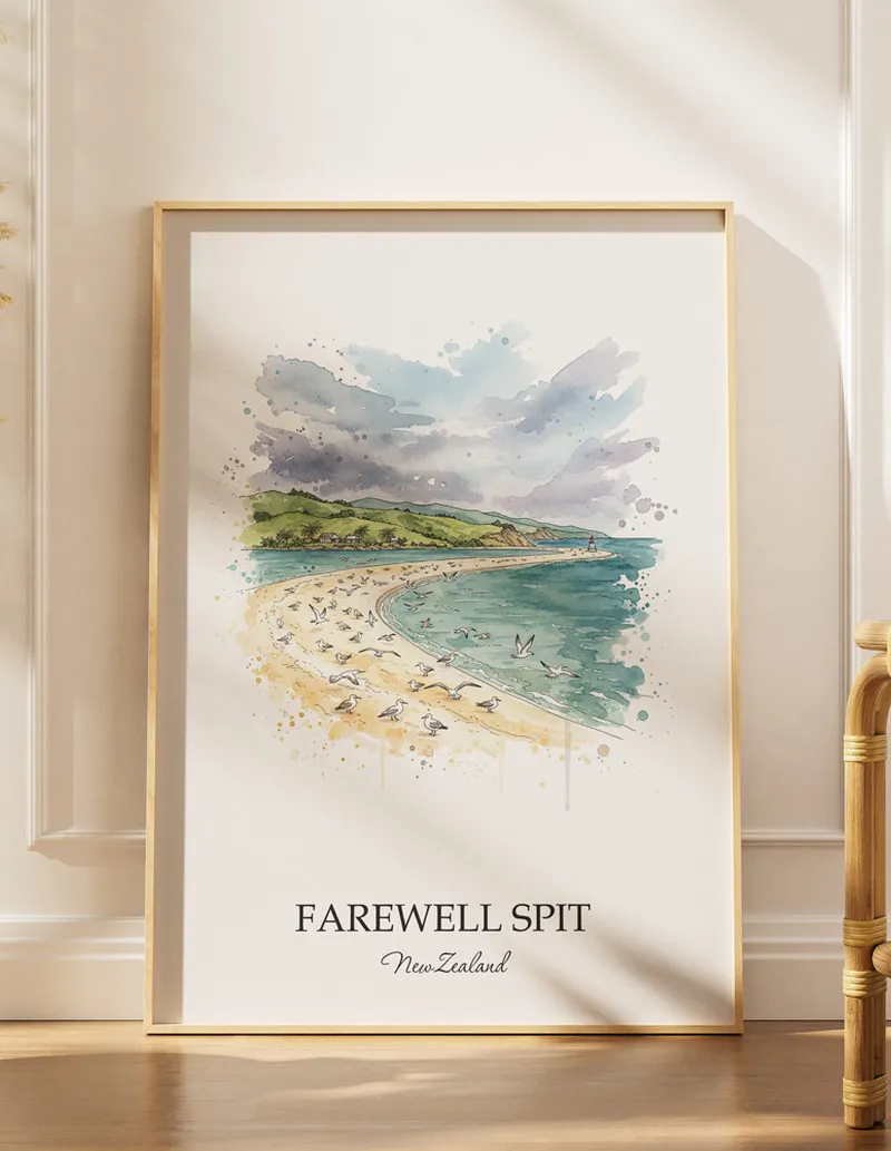 A gorgeous boho-inspired living space with a framed vintage travel poster of Farewell Spit in New Zealand on display.