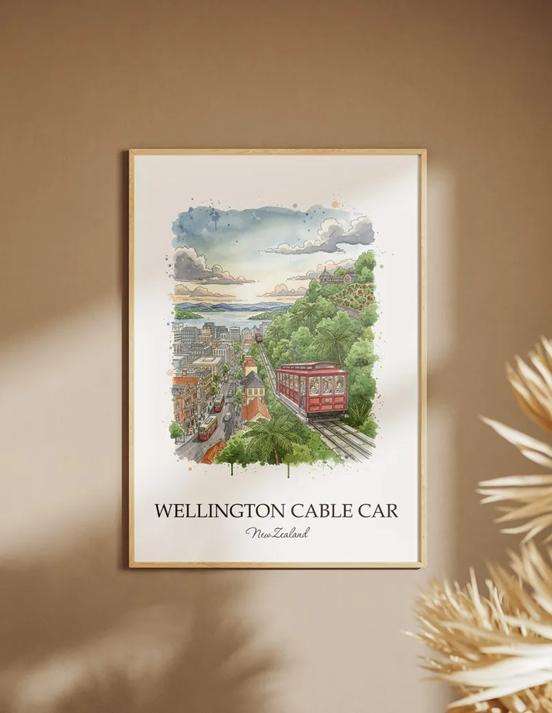 Framed wall art featuring Wellington Cable Car, New Zealand in a light wood frame hanging above a sofa in a modern living room.
