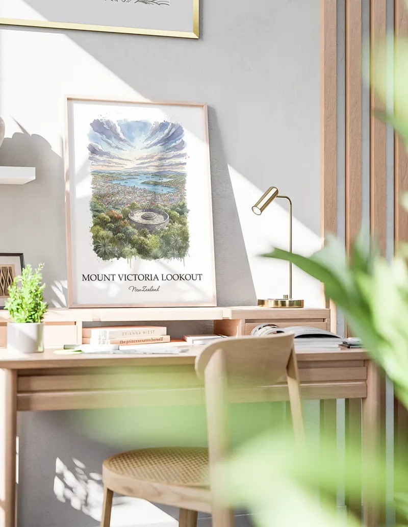 Minimalist poster of Mount Victoria Lookout in New Zealand in a light frame standing by a window in a boho style room.