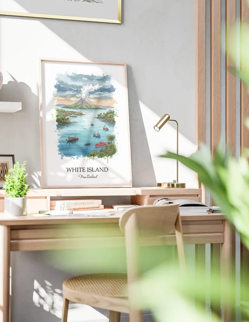 Minimalist poster of White Island in New Zealand in a light frame standing by a window in a boho style room.