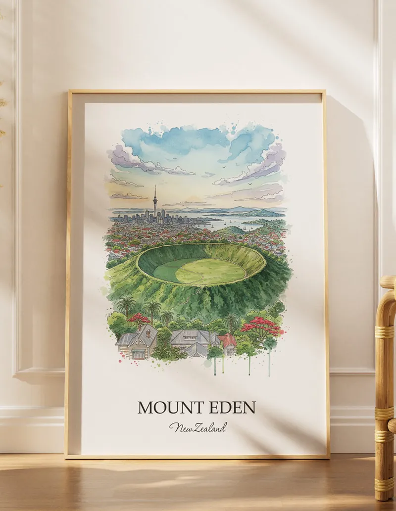 A gorgeous boho-inspired living space with a framed vintage travel poster of Mount Eden in New Zealand on display.