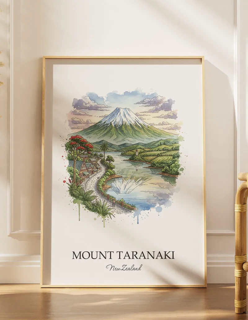 A gorgeous boho-inspired living space with a framed vintage travel poster of Mount Taranaki in New Zealand on display.
