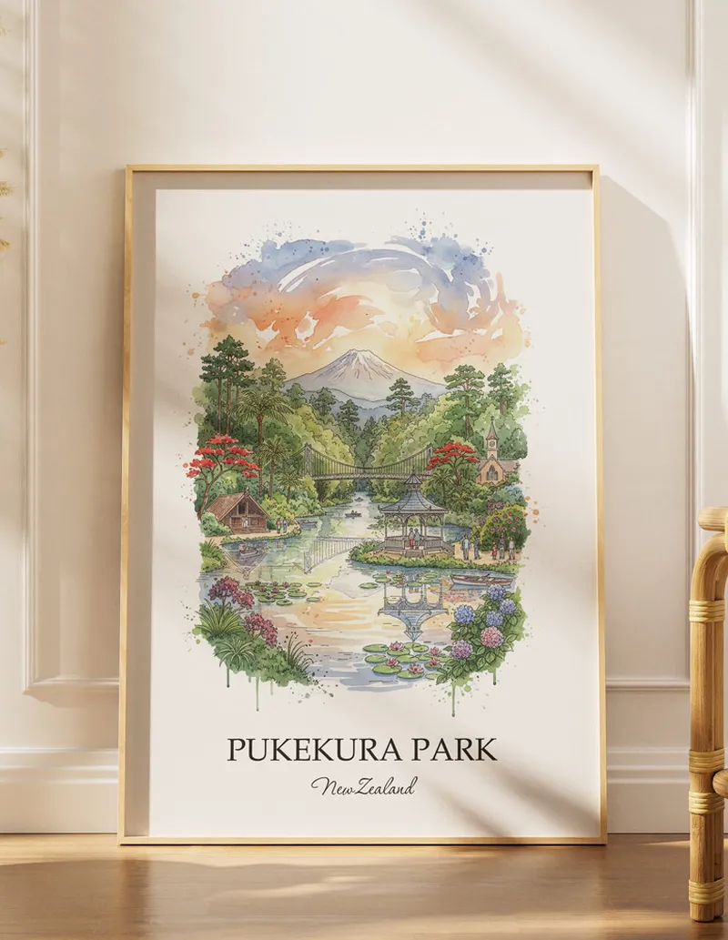 A gorgeous boho-inspired living space with a framed vintage travel poster of Pukekura Park in New Zealand on display.