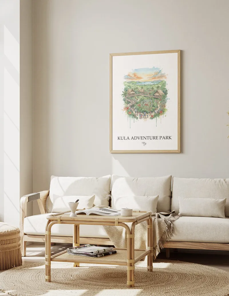 Framed wall art featuring Kula Adventure Park in Fiji in a light wood frame leaning on the floor.
