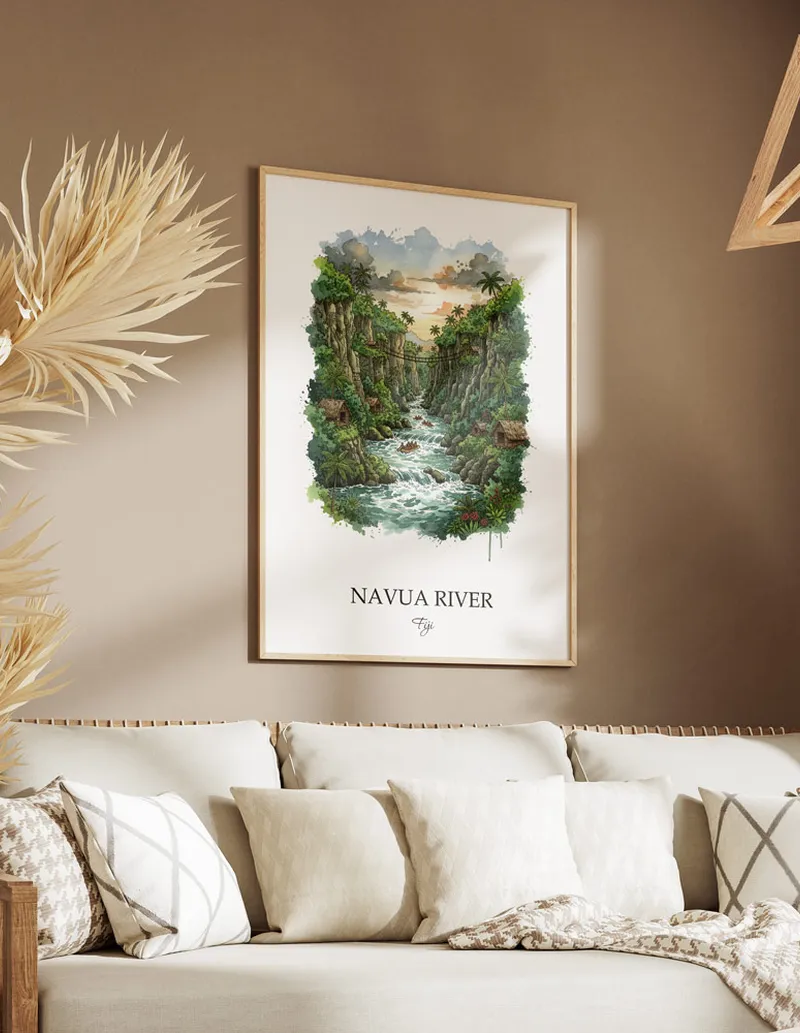 Minimalist poster of Navua River in Fiji in a light frame standing on the floor in a dark moody interior.