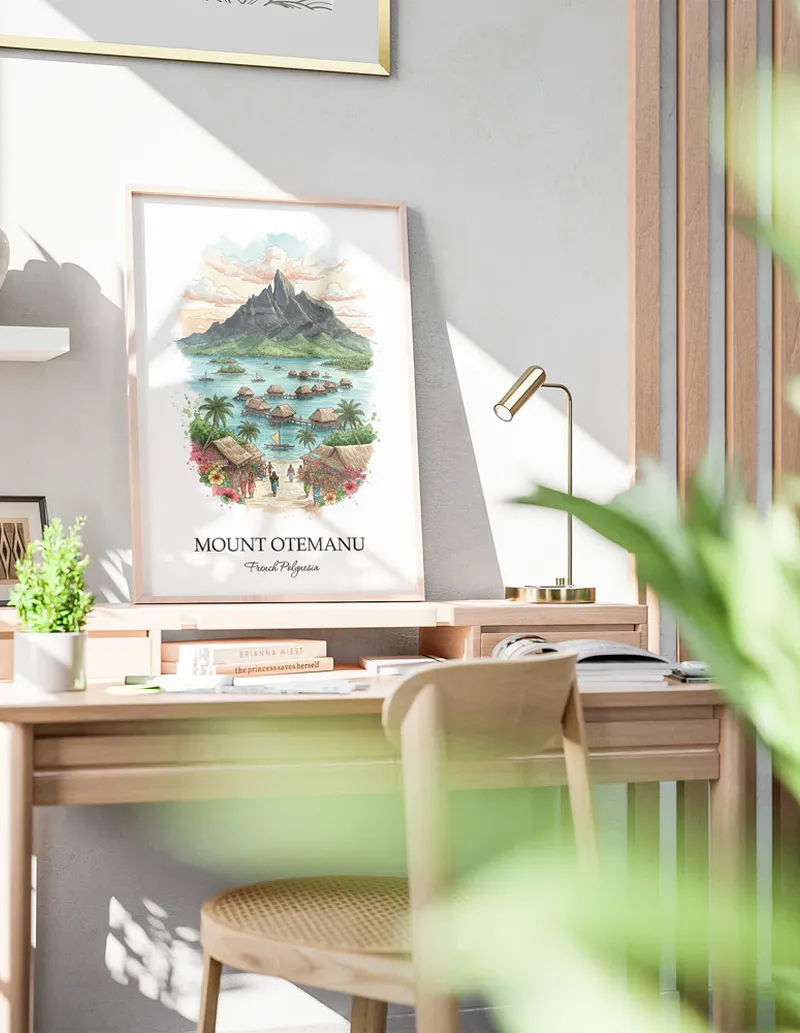 Framed wall art featuring Mount Otemanu, French Polynesia in a light wood frame hanging above a sofa in a modern living room.