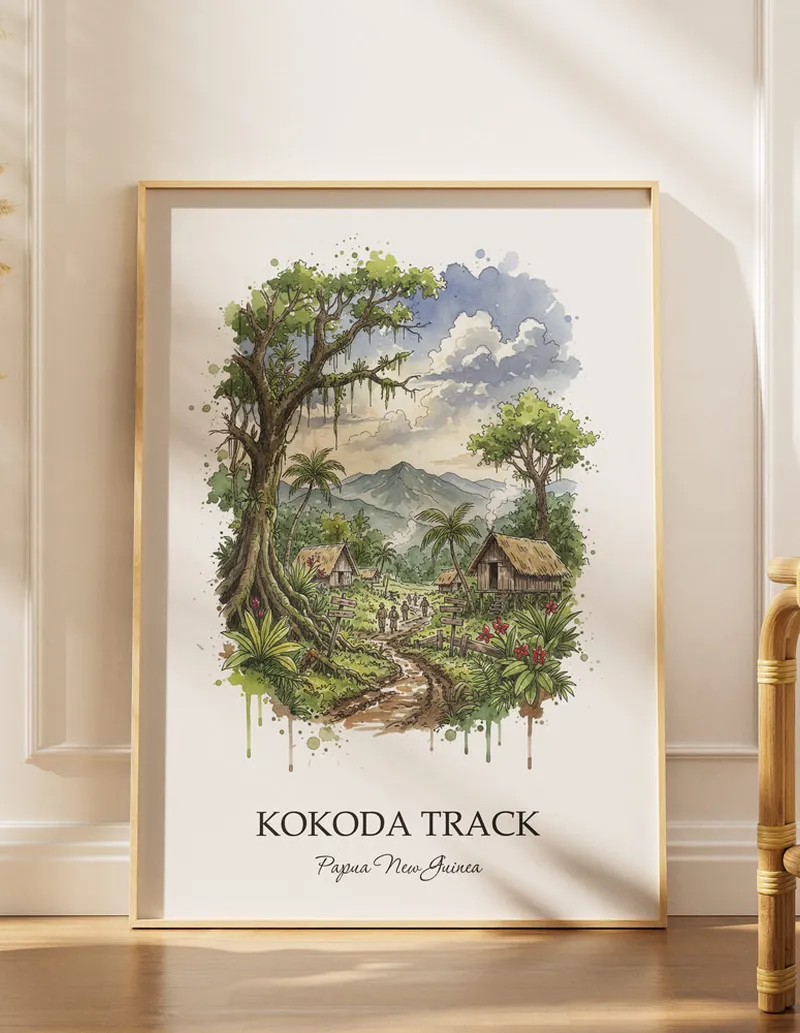 Cozy, well-lit workspace with a minimalist poster of Kokoda Track, Papua New Guinea in a light frame sitting on the desk.
