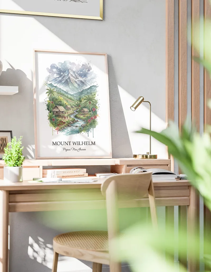 Framed wall art featuring Mount Wilhelm, Papua New Guinea in a light wood frame hanging above a sofa in a modern living room.
