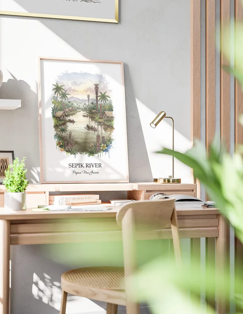 Framed wall art featuring Sepik River, Papua New Guinea in a light wood frame hanging above a sofa in a modern living room.
