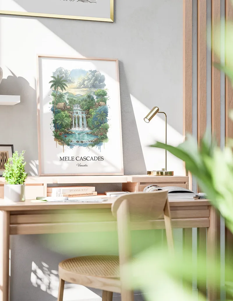 Framed wall art featuring Mele Cascades, Vanuatu in a light wood frame hanging above a sofa in a modern living room.