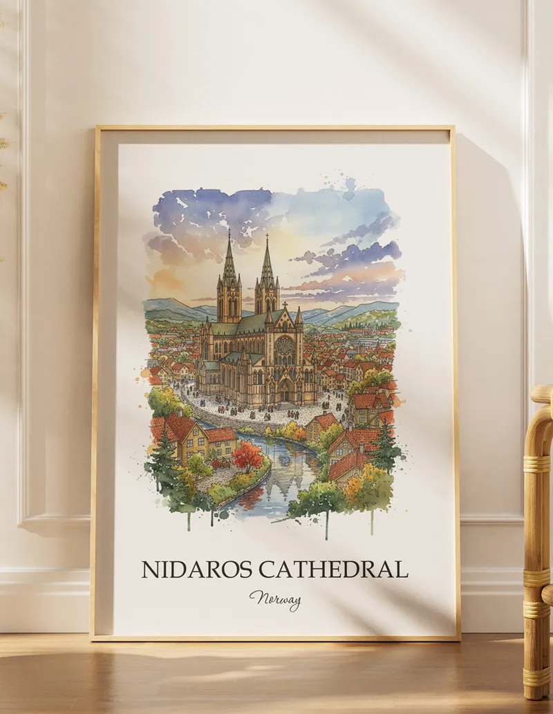 Framed wall art featuring Nidaros Cathedral in Norway in a light wood frame leaning on the floor.