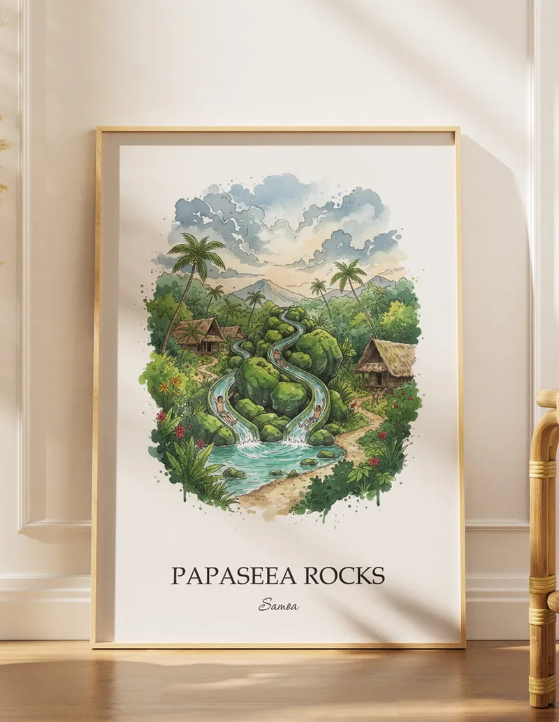 Cozy, well-lit workspace with a minimalist poster of Papaseea Rocks, Samoa in a light frame sitting on the desk.