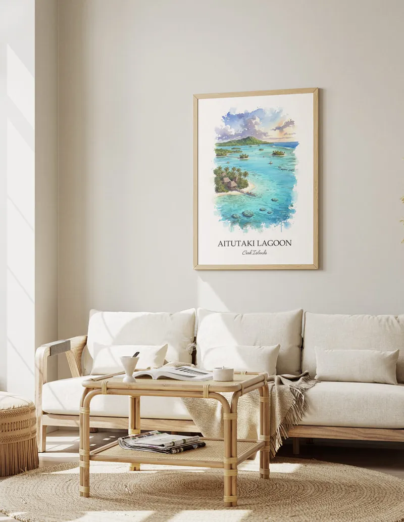 Minimalist poster of Aitutaki Lagoon in Cook Islands in a light frame standing on the floor in a dark moody interior.