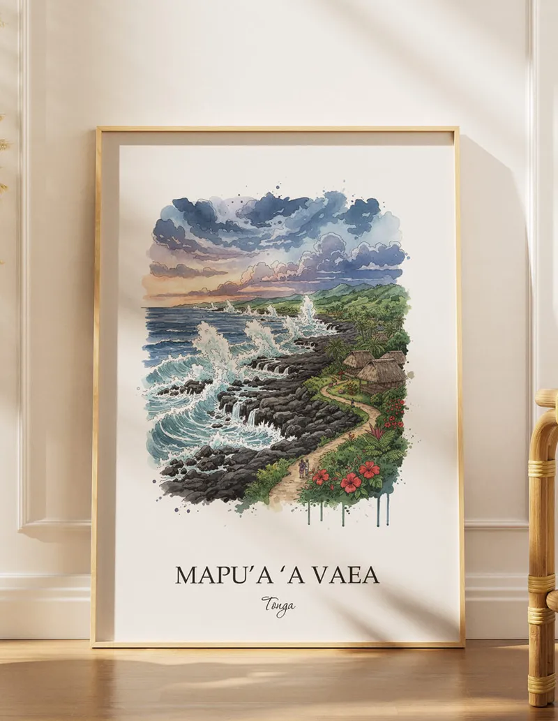 Cozy, well-lit workspace with a minimalist poster of Mapu'a 'a Vaea, Tonga in a light frame sitting on the desk.